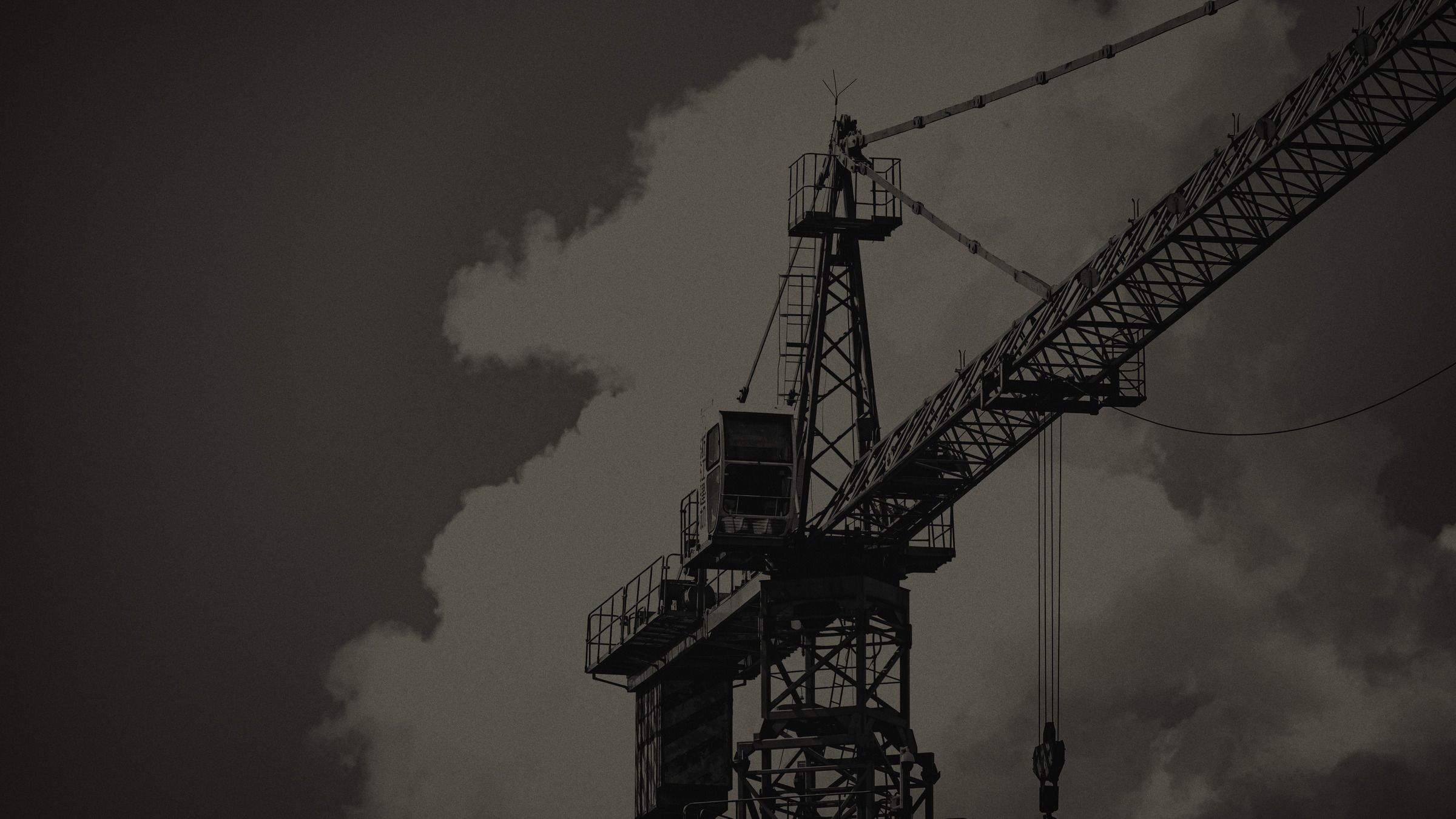 Tower crane against an overcast sky